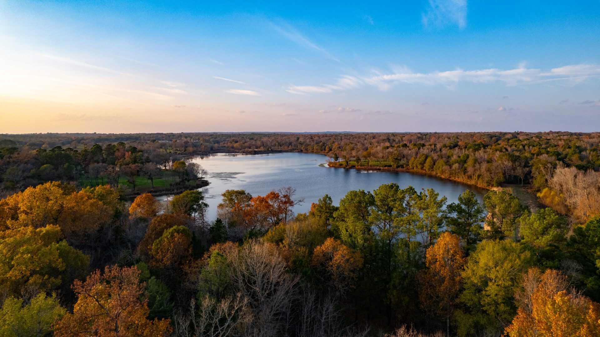 a lake surrounded by trees.